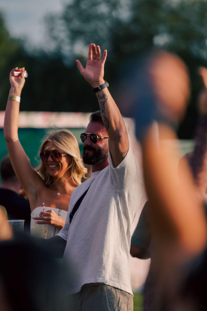 Professional photographer and videographer UK capturing candid moments at outdoor event